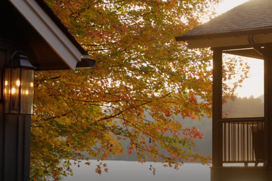 Inspiration for a large transitional side porch remodel in Other