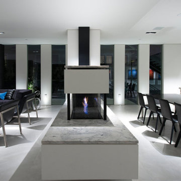 Georgina Avenue Santa Monica modern open plan home dining & living room fireplac