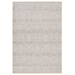 Jaipur Living - Vibe by Jaipur Living Wayreth Floral Taupe/ Silver Runner Rug 3'X8' - The stunning En Blanc collection captures the elegance of neutral, vintage-inspired patterns and melds Old World aesthetics with an updated and luxurious vibe. The Wayreth rug boasts a repeating, floral trellis design in tonal hues of taupe, silver, cream, and hints of gold. Soft and lustrous, this chameleon-like design emulates the timeless style of a Turkish hand-knotted rug, but in an accessible polyester and viscose power-loomed quality. This traditional accent piece thrives in low traffic areas of the home like bedrooms, formal dining areas, formal living spaces, and sitting rooms.