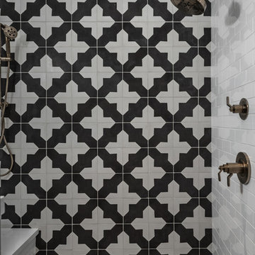 Graphic Tile Walk-In Shower with Brass Fixtures