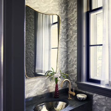 Powder Room with Soapstone Sink and Patterned Wallpaper