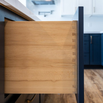 Modern Navy Blue Kitchen with White Quartz Island | The Cabination