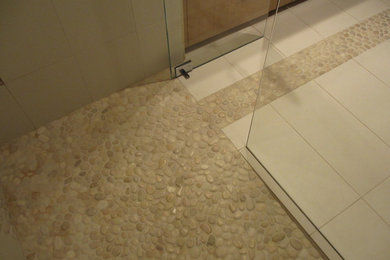 Walk-in shower - mid-sized contemporary white tile and porcelain tile porcelain tile walk-in shower idea in Denver with open cabinets and solid surface countertops