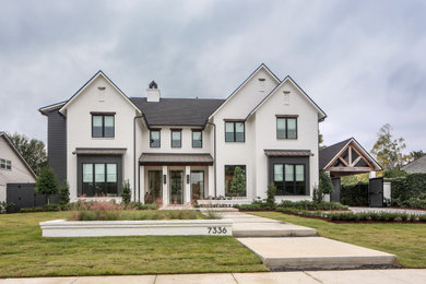 Inspiration for a large contemporary white two-story mixed siding house exterior remodel in New Orleans