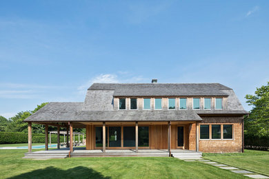 Example of a transitional exterior home design in New York