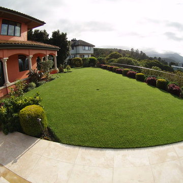 Artificial grass installation on backyard