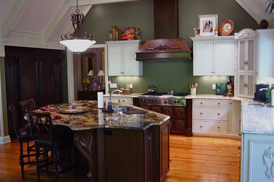 Example of a huge classic kitchen design in Other