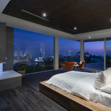 Los Tilos Hollywood Hills luxury home modern glass walled primary bedroom