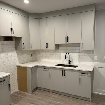 Tiny kitchen storage maximized with our all white custom cabinets