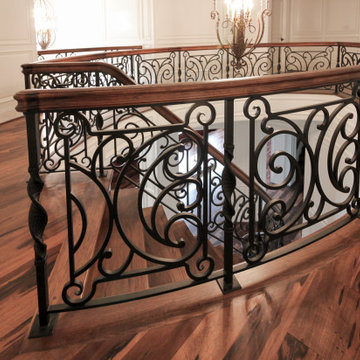 Project #74 | Circular Staircase with Hand-Forged Metal Panels