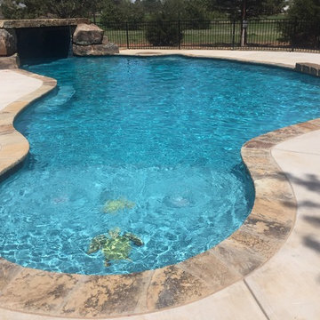 Custom Concrete Pool with Grotto and Waterfall