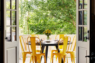 Inspiration for a transitional deck remodel in Other with a roof extension