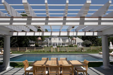 Example of a beach style pool design in New York