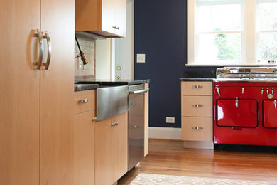 Small trendy galley eat-in kitchen photo in Other with flat-panel cabinets, light wood cabinets, multicolored backsplash and wood backsplash