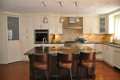 Example of a transitional kitchen design in Toronto