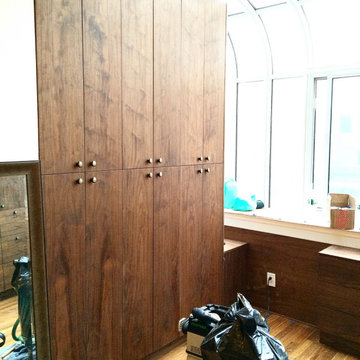 Custom Walnut cabinets with radiator conceal