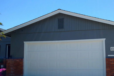 Inspiration for a small transitional blue one-story mixed siding exterior home remodel with a shingle roof