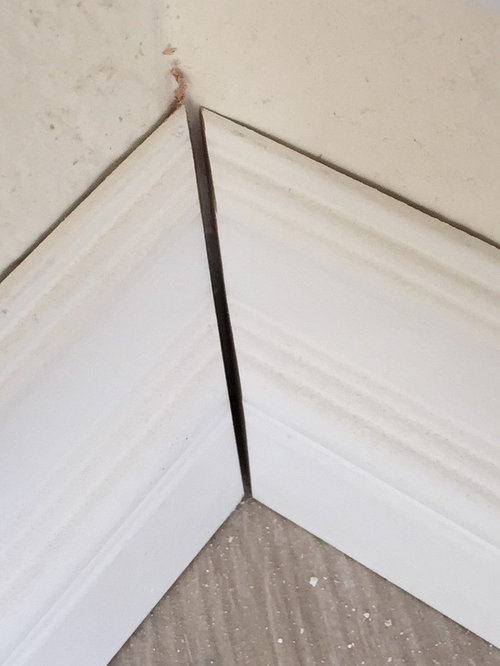 How To Fill Corner Gaps In Baseboard Trim