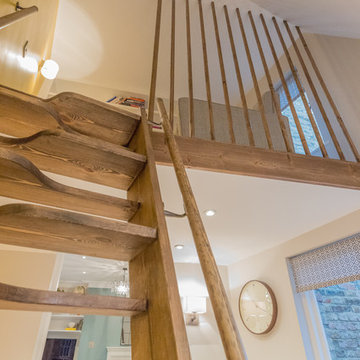 Mezzanine study space with paddle staircase and full heigh balustrade