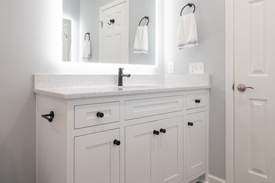 Inspiration for a contemporary ceramic tile ceramic tile and gray floor bathroom remodel in Charleston with gray walls