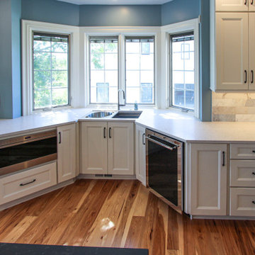 White and Gray Kitchen with Massive Storage Solutions