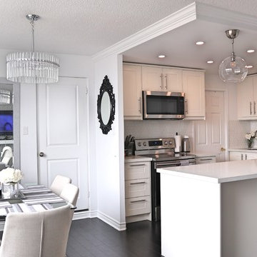L-shaped 5'x7' IKEA kitchen with 6' island. Grimslov off-white finish.