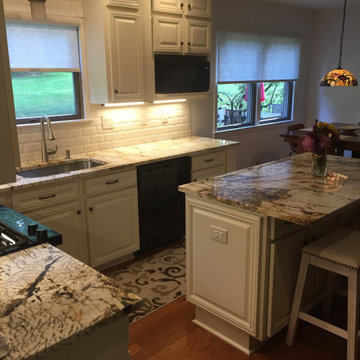 Cabinet refacing—removal of bulkhead antique white cabinets