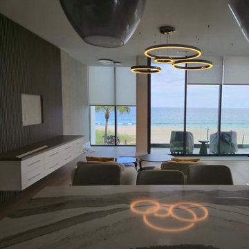 Modern Multi-Ring LED Chandelier Installation - Oceanfront Residence
