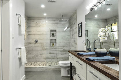 Bathroom - industrial bathroom idea in Austin