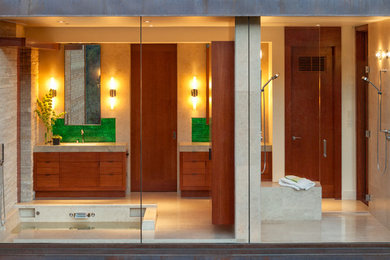 Bathroom - large contemporary master beige tile and stone slab limestone floor bathroom idea in San Francisco with flat-panel cabinets, medium tone wood cabinets, an undermount sink, a two-piece toilet and beige walls