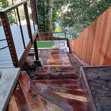 A Steeply Sloped Backyard is Transformed Into a Multi-Level Entertainment Venue