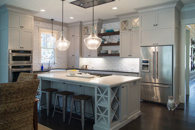 Design ideas for a large country l-shaped separate kitchen in Atlanta with shaker cabinets, grey cabinets, quartz benchtops, white splashback, subway tile splashback, stainless steel appliances, dark hardwood floors and with island.