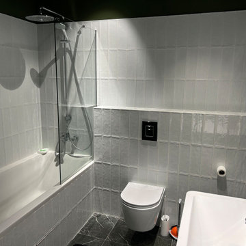Modern Green Bathroom with White Subway Tile and Wall-Hung Toilet – Moscow Apart