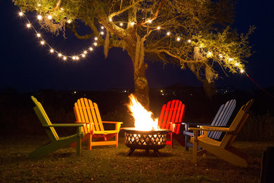 Example of a beach style home design design in Charleston