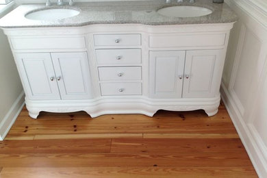 Light wood floor bathroom photo in Charleston