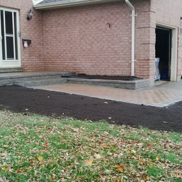 New front veranda, garden bed, walkway, re-lay driveway