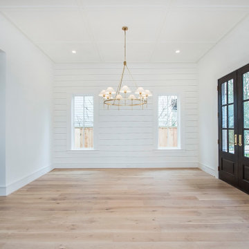 Clean & Modern White Farmhouse on E. 10th St.
