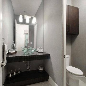 Spanish Transitional Powder Bath with Sculpted Wood Floating Vanity