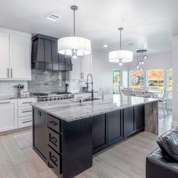 Modern Kitchen with Marble Island and Pendant Lights