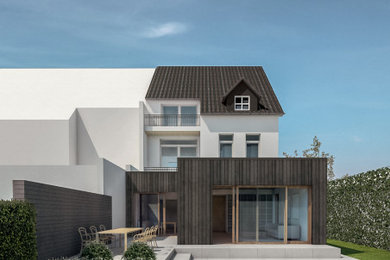 Modernes Haus mit schwarzer Fassadenfarbe und Flachdach in Dortmund