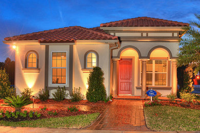 Small mediterranean exterior home idea in Jacksonville