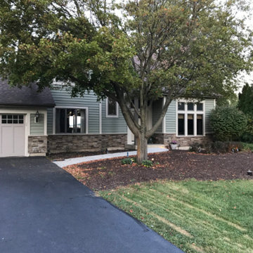 Oswego Home Receives Stone Wainscoting and New Siding