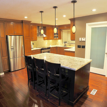 Marquis Tuscan Maple Kitchen and island by Ken Nielsen 613-227-4694