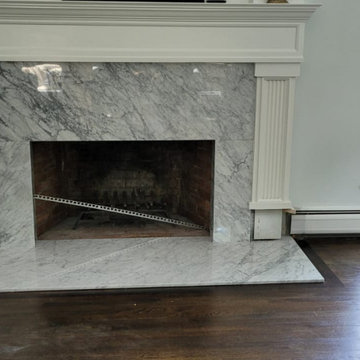 2x White Carrara Marble Fireplaces