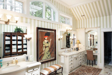 Bathroom - large traditional master marble floor and white floor bathroom idea in Milwaukee with an undermount sink, raised-panel cabinets, white cabinets, multicolored walls and marble countertops