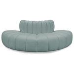 Meridian Furniture - Arc Upholstered Outward Curved Modular Sectional, Green, 4-Piece: 4 Reverse Corner, Vegan Leather - Unleash modern opulence with the Arc Vegan Leather 4pc. Sectional. Crafted for the modern connoisseur, this Sectional injects an air of refined luxury into any space. Its sleek silhouette, upholstered in supple mint green vegan leather, exudes timeless sophistication while the deep channel tufting adds textural intrigue, further elevating the chair's visual appeal. The modular design makes it a versatile chameleon, effortlessly adapting to your evolving needs and preferences. Whether you envision it gracing a chic living room corner, basking in the glow of a bedroom window, or adding a touch of drama to a home office, the Arc seamlessly complements your unique interior aesthetic.