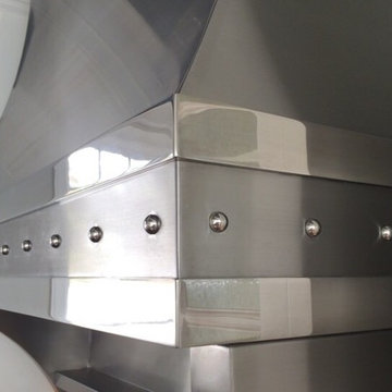 Stainless hood polished trim with river detail