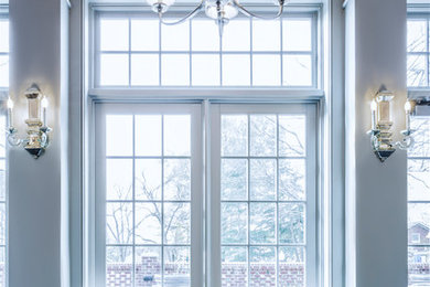 Example of a classic dark wood floor and blue floor sunroom design in Other with a standard ceiling