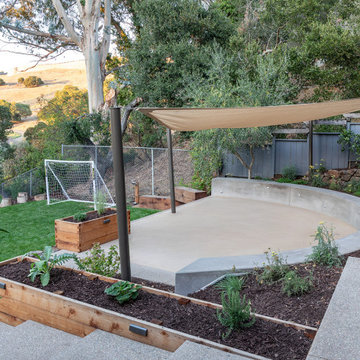 DG Patio with Shade Sails above Soccer Field terrace