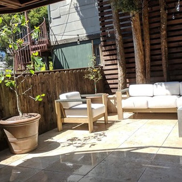 Split Level Travertine Patio and Ipe Deck with Cable Railing